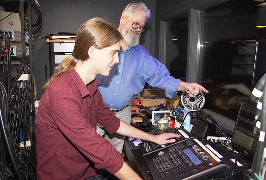 Students learn about lighting in the theater